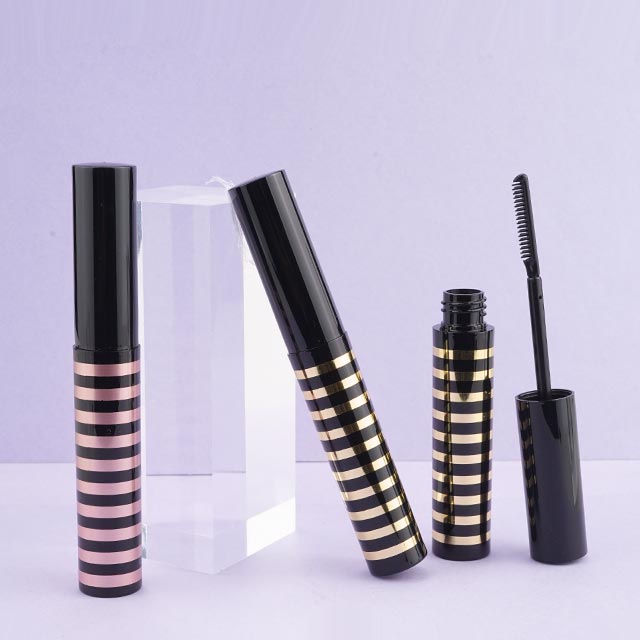 mascara tube with comb brush