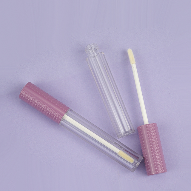 Round clear lipgloss tube with unique plastic cap