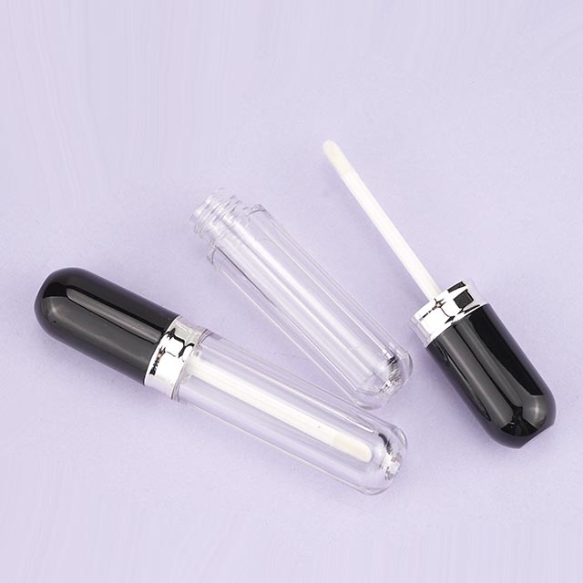 Lipgloss tube with shiny black cap