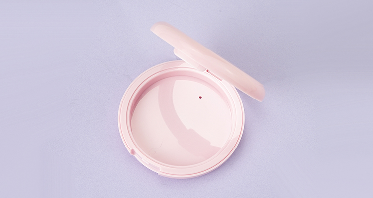 Pink compact powder case with mirror