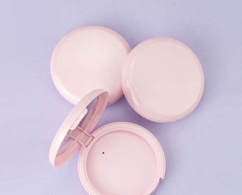 Pink compact powder case with mirror