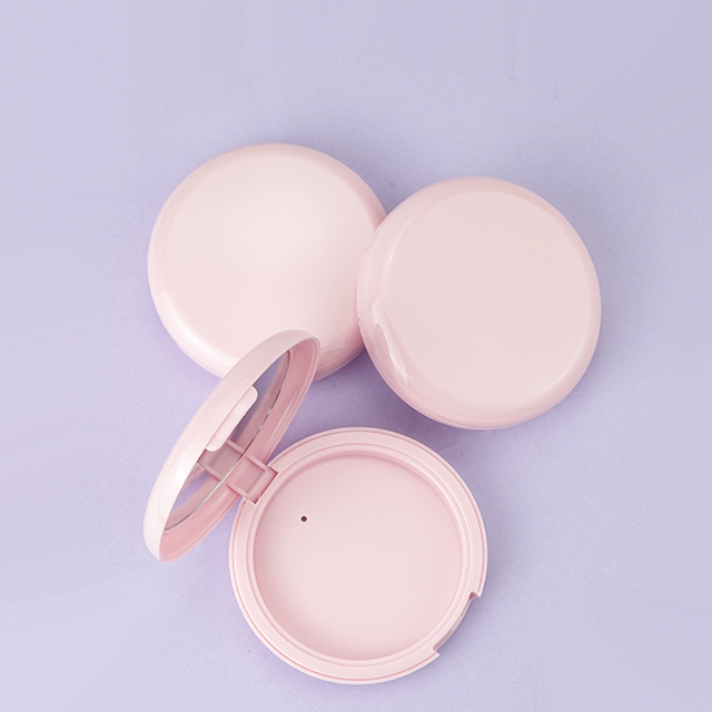 Pink compact powder case with mirror