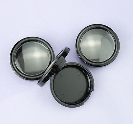 Black round powder case with window