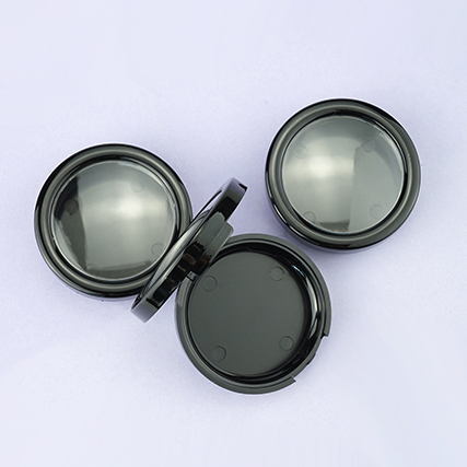 Black round powder case with window