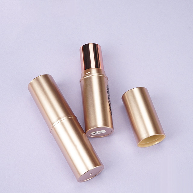 Gold foundation blush stick container