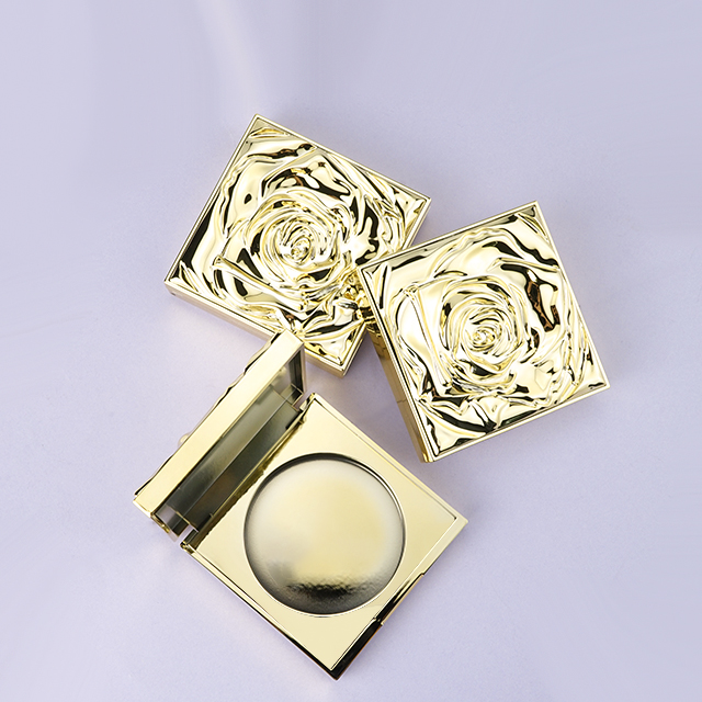 Luxury gold compact powder case with rose cap