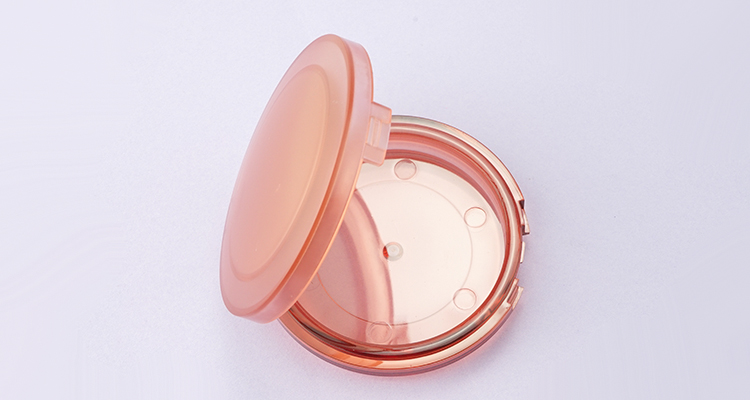 Frosted pink round compact powder case with mirror