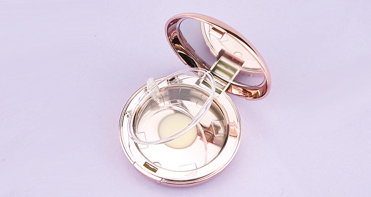 Rose gold round compact powder case with mirror