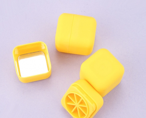 Yellow lip balm jar