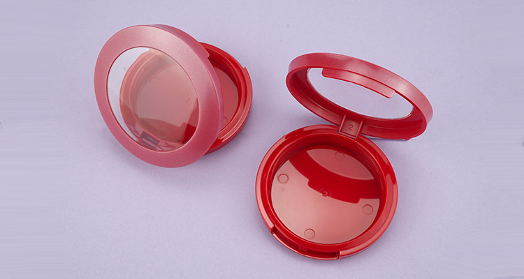 Red color round compact powder case with window