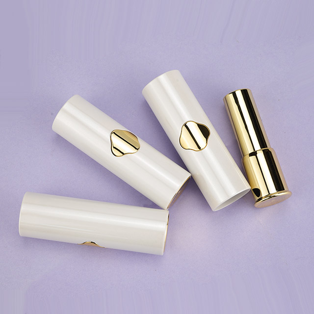 Lipstick tube with click button