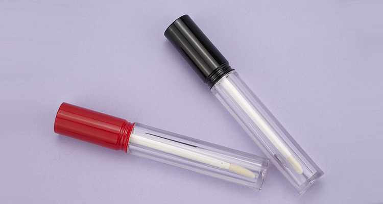 Clear lipgloss tube with black/red cap