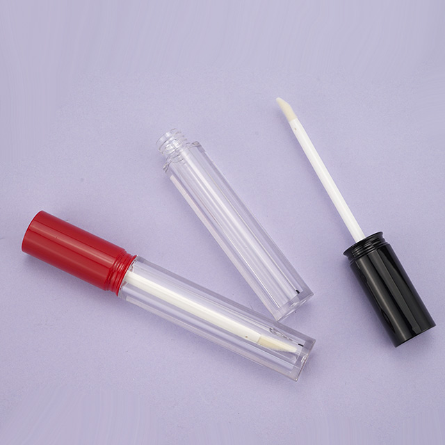 Clear lipgloss tube with black/red cap