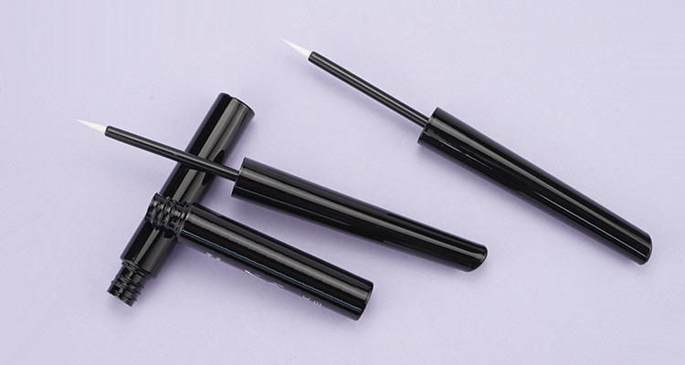 Black eyeliner tube with long cap