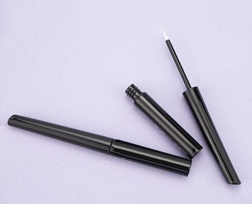 Black eyeliner tube with long cap