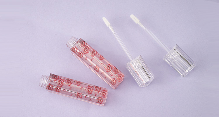 Lipgloss tube with flower artwork